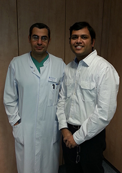 Dr. Chandresh Sharma receiving an award